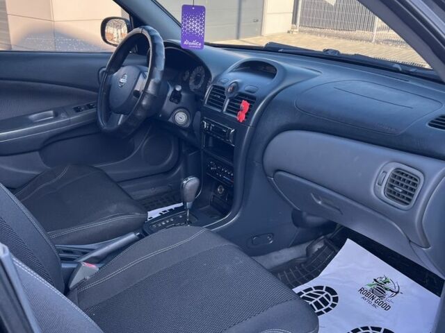 Черный Ниссан Альмера Классик, объемом двигателя 1.6 л и пробегом 250 тыс. км за 4800 $, фото 18 на Automoto.ua