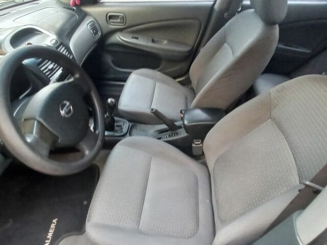 Черный Ниссан Альмера Классик, объемом двигателя 1.6 л и пробегом 149 тыс. км за 4499 $, фото 23 на Automoto.ua