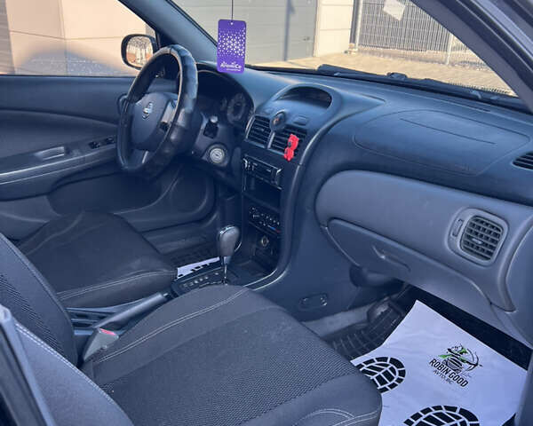 Черный Ниссан Альмера Классик, объемом двигателя 1.6 л и пробегом 250 тыс. км за 4800 $, фото 17 на Automoto.ua