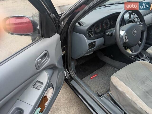 Чорний Ніссан Альмера Класік, об'ємом двигуна 1.6 л та пробігом 58 тис. км за 7100 $, фото 10 на Automoto.ua