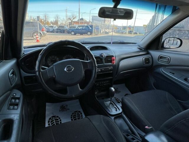 Черный Ниссан Альмера Классик, объемом двигателя 1.6 л и пробегом 250 тыс. км за 4800 $, фото 16 на Automoto.ua