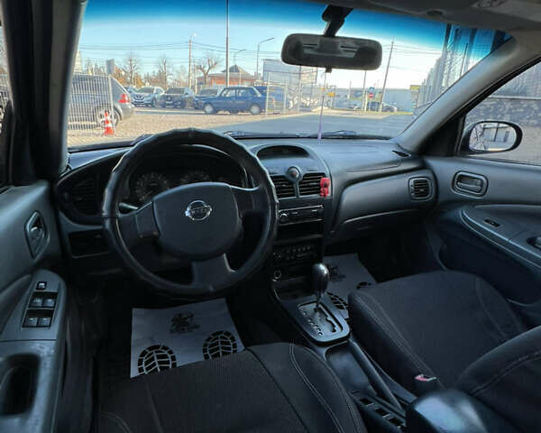 Черный Ниссан Альмера Классик, объемом двигателя 1.6 л и пробегом 250 тыс. км за 4800 $, фото 16 на Automoto.ua