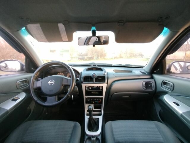 Чорний Ніссан Альмера Класік, об'ємом двигуна 1.6 л та пробігом 244 тис. км за 4500 $, фото 13 на Automoto.ua