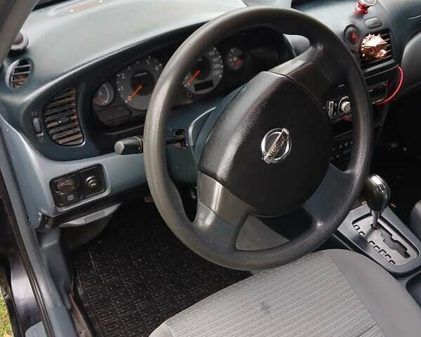 Черный Ниссан Альмера Классик, объемом двигателя 1.6 л и пробегом 182 тыс. км за 3600 $, фото 13 на Automoto.ua