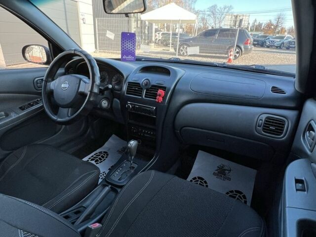 Черный Ниссан Альмера Классик, объемом двигателя 1.6 л и пробегом 250 тыс. км за 4800 $, фото 17 на Automoto.ua