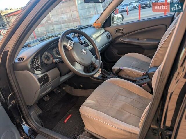 Чорний Ніссан Альмера Класік, об'ємом двигуна 1.6 л та пробігом 58 тис. км за 7100 $, фото 9 на Automoto.ua