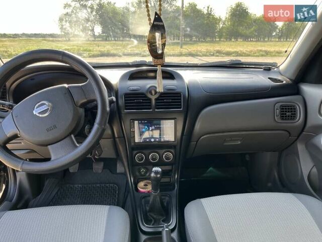 Черный Ниссан Альмера Классик, объемом двигателя 1.6 л и пробегом 150 тыс. км за 5100 $, фото 9 на Automoto.ua