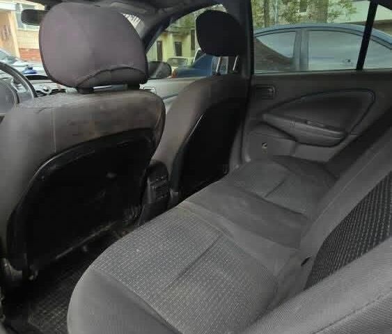 Черный Ниссан Альмера Классик, объемом двигателя 1.6 л и пробегом 300 тыс. км за 2000 $, фото 1 на Automoto.ua