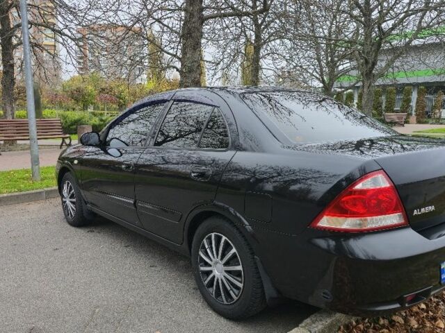 Черный Ниссан Альмера Классик, объемом двигателя 1.6 л и пробегом 333 тыс. км за 5000 $, фото 3 на Automoto.ua