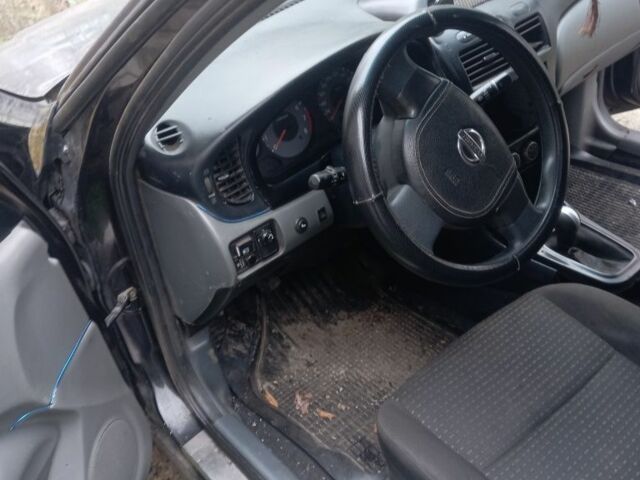 Черный Ниссан Альмера Классик, объемом двигателя 1.6 л и пробегом 300 тыс. км за 2000 $, фото 4 на Automoto.ua