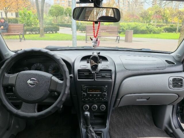 Черный Ниссан Альмера Классик, объемом двигателя 1.6 л и пробегом 333 тыс. км за 5000 $, фото 5 на Automoto.ua