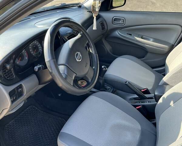 Черный Ниссан Альмера Классик, объемом двигателя 1.6 л и пробегом 150 тыс. км за 5100 $, фото 7 на Automoto.ua