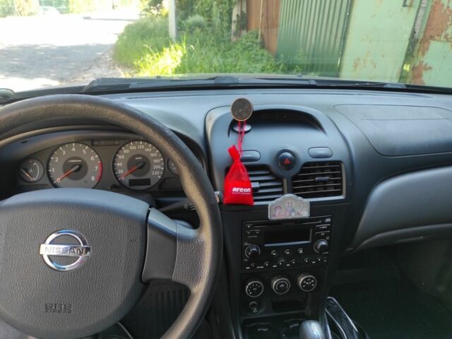 Черный Ниссан Альмера Классик, объемом двигателя 1.6 л и пробегом 222 тыс. км за 5200 $, фото 11 на Automoto.ua
