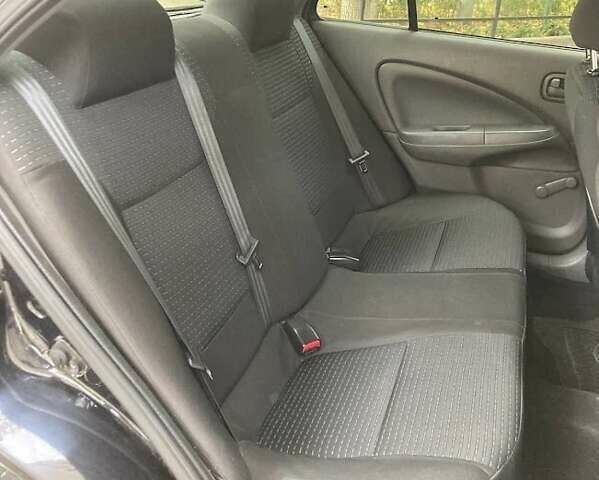 Черный Ниссан Альмера Классик, объемом двигателя 1.6 л и пробегом 155 тыс. км за 4200 $, фото 3 на Automoto.ua