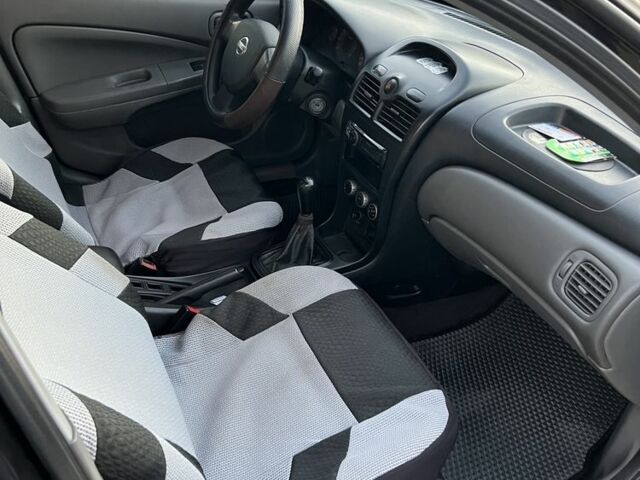 Черный Ниссан Альмера Классик, объемом двигателя 1.6 л и пробегом 230 тыс. км за 3400 $, фото 6 на Automoto.ua