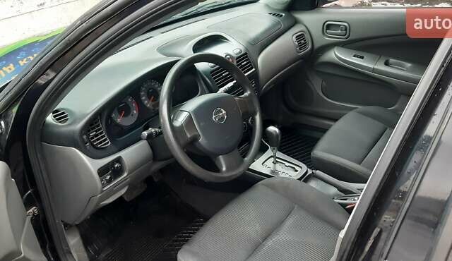 Черный Ниссан Альмера Классик, объемом двигателя 1.6 л и пробегом 187 тыс. км за 6550 $, фото 1 на Automoto.ua