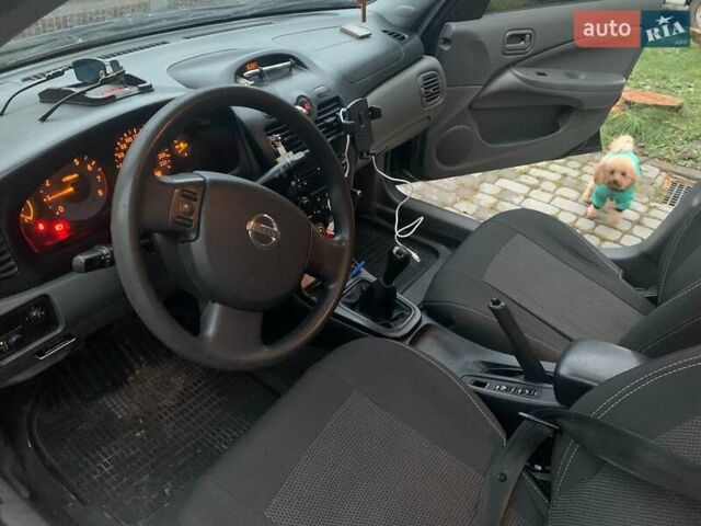Черный Ниссан Альмера Классик, объемом двигателя 1.6 л и пробегом 167 тыс. км за 5999 $, фото 3 на Automoto.ua
