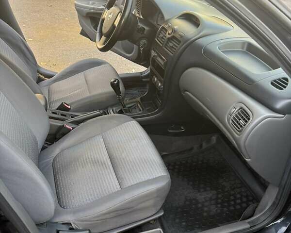 Черный Ниссан Альмера Классик, объемом двигателя 1.6 л и пробегом 261 тыс. км за 5100 $, фото 6 на Automoto.ua