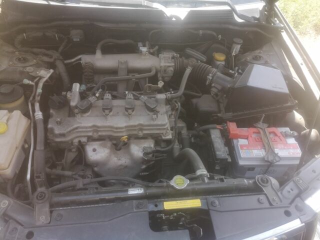 Черный Ниссан Альмера Классик, объемом двигателя 1.6 л и пробегом 38 тыс. км за 6800 $, фото 4 на Automoto.ua