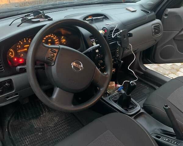 Черный Ниссан Альмера Классик, объемом двигателя 1.6 л и пробегом 167 тыс. км за 5999 $, фото 5 на Automoto.ua