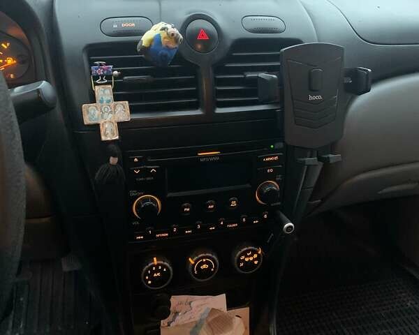 Черный Ниссан Альмера Классик, объемом двигателя 1.6 л и пробегом 167 тыс. км за 5999 $, фото 2 на Automoto.ua