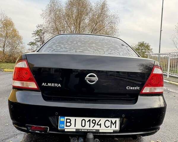 Черный Ниссан Альмера Классик, объемом двигателя 1.6 л и пробегом 261 тыс. км за 5100 $, фото 12 на Automoto.ua