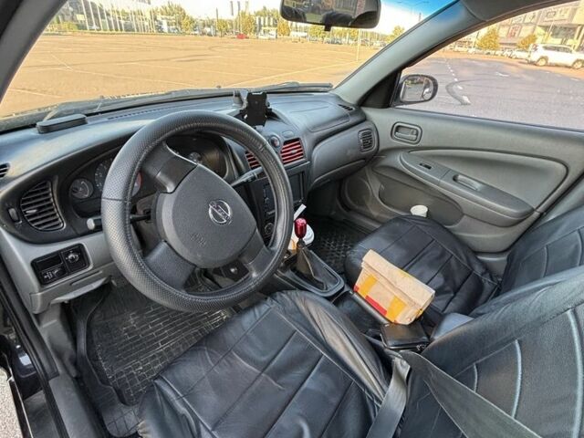 Чорний Ніссан Альмера Класік, об'ємом двигуна 1.6 л та пробігом 188 тис. км за 5900 $, фото 4 на Automoto.ua