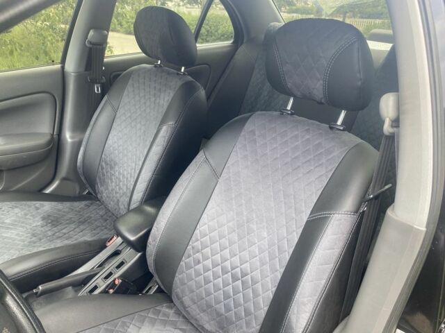 Черный Ниссан Альмера Классик, объемом двигателя 1.6 л и пробегом 157 тыс. км за 5000 $, фото 6 на Automoto.ua