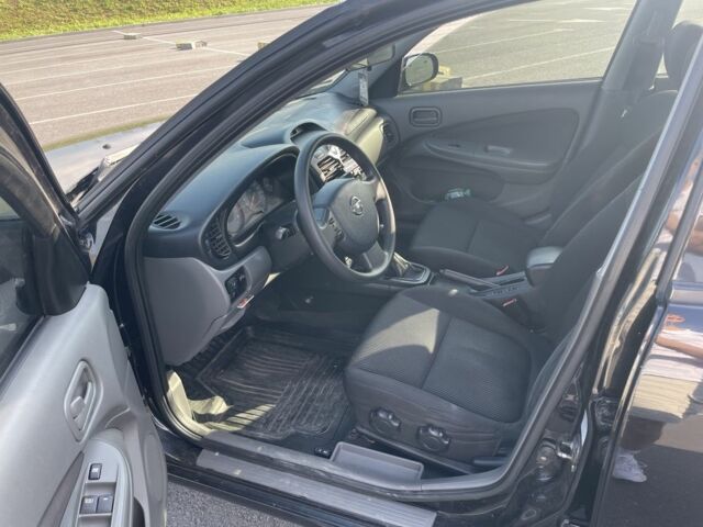 Чорний Ніссан Альмера Класік, об'ємом двигуна 1.6 л та пробігом 242 тис. км за 5000 $, фото 12 на Automoto.ua