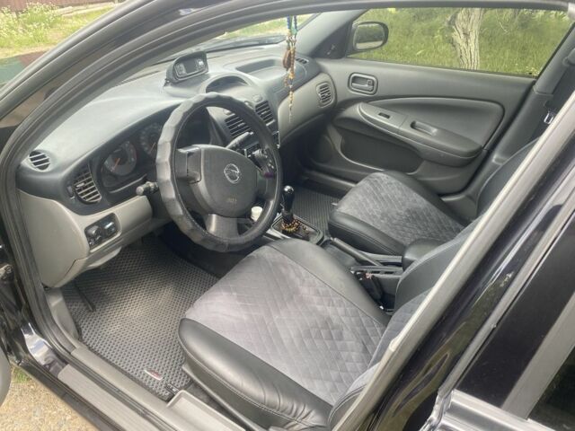 Черный Ниссан Альмера Классик, объемом двигателя 1.6 л и пробегом 157 тыс. км за 5000 $, фото 5 на Automoto.ua