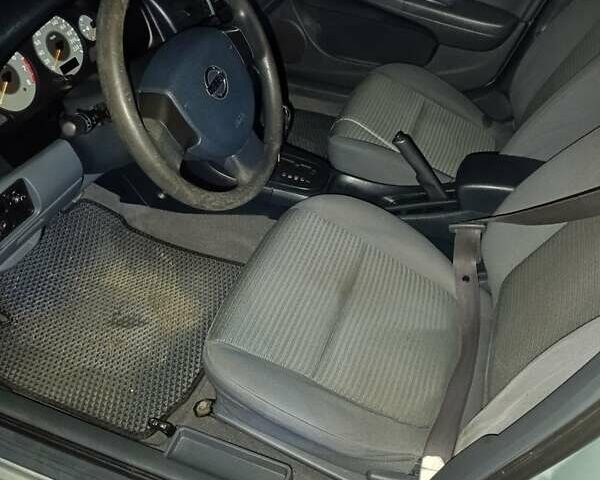 Серый Ниссан Альмера Классик, объемом двигателя 1.6 л и пробегом 271 тыс. км за 4700 $, фото 3 на Automoto.ua