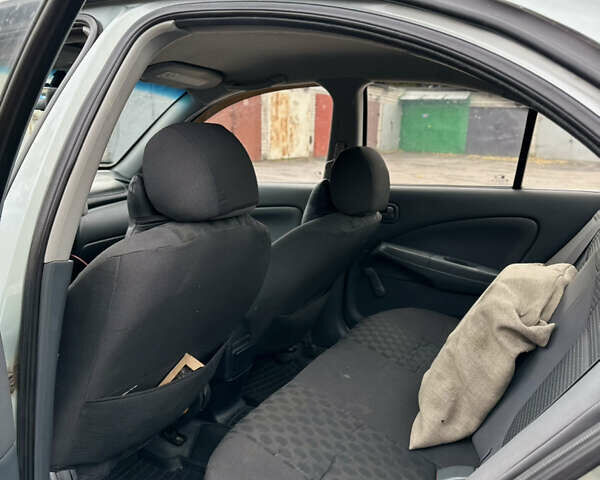 Сірий Ніссан Альмера Класік, об'ємом двигуна 1.6 л та пробігом 261 тис. км за 2700 $, фото 12 на Automoto.ua