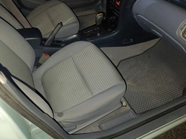 Серый Ниссан Альмера Классик, объемом двигателя 1.6 л и пробегом 271 тыс. км за 4700 $, фото 5 на Automoto.ua