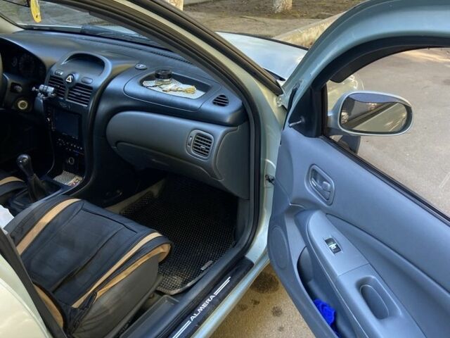 Серый Ниссан Альмера Классик, объемом двигателя 1.6 л и пробегом 284 тыс. км за 3900 $, фото 16 на Automoto.ua