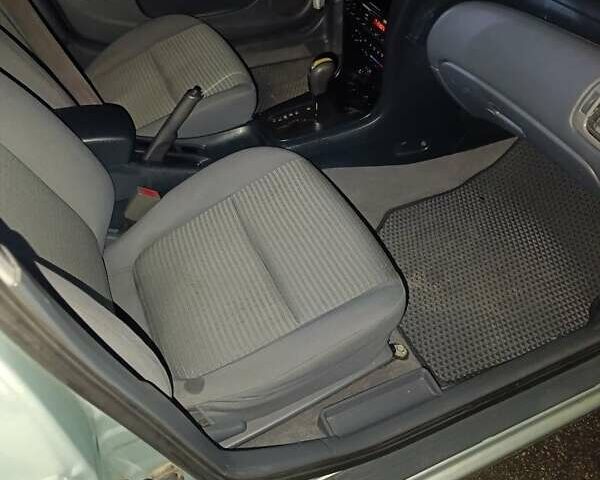 Серый Ниссан Альмера Классик, объемом двигателя 1.6 л и пробегом 271 тыс. км за 4700 $, фото 4 на Automoto.ua