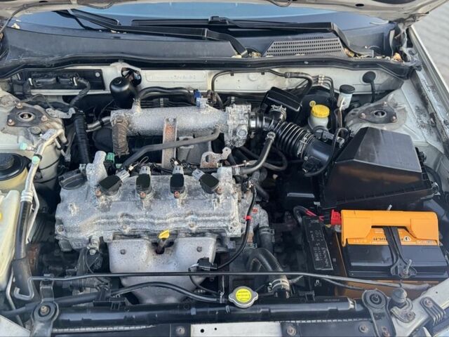 Серый Ниссан Альмера Классик, объемом двигателя 1.6 л и пробегом 340 тыс. км за 4199 $, фото 16 на Automoto.ua