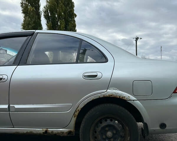 Сірий Ніссан Альмера Класік, об'ємом двигуна 1.6 л та пробігом 261 тис. км за 2700 $, фото 7 на Automoto.ua