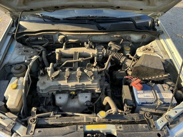 Серый Ниссан Альмера Классик, объемом двигателя 1.6 л и пробегом 100 тыс. км за 5700 $, фото 13 на Automoto.ua