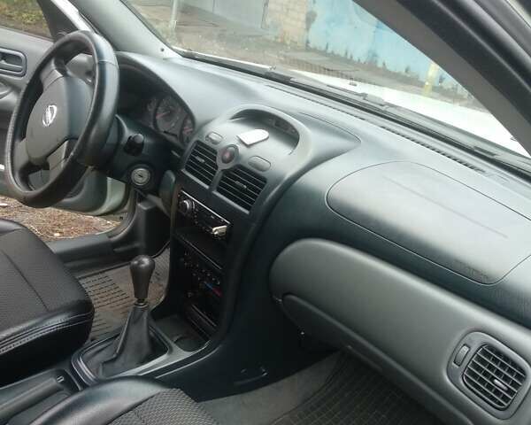 Серый Ниссан Альмера Классик, объемом двигателя 1.6 л и пробегом 161 тыс. км за 4400 $, фото 3 на Automoto.ua