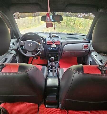 Сірий Ніссан Альмера Класік, об'ємом двигуна 1.6 л та пробігом 167 тис. км за 4400 $, фото 4 на Automoto.ua