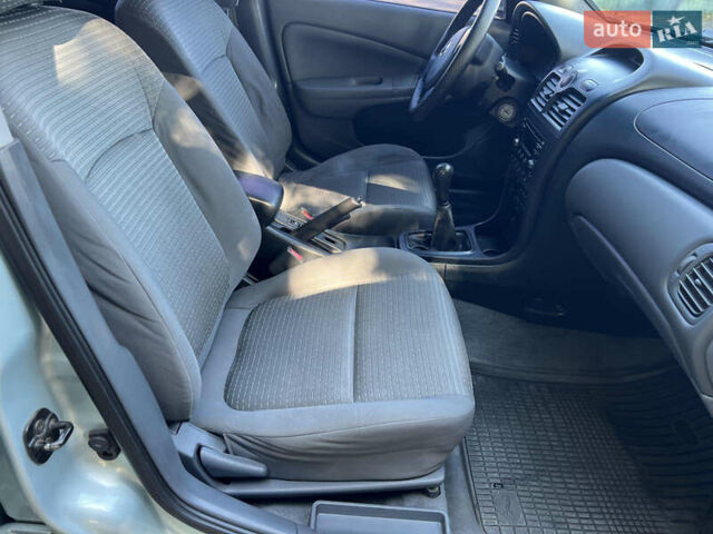 Серый Ниссан Альмера Классик, объемом двигателя 1.6 л и пробегом 198 тыс. км за 5200 $, фото 17 на Automoto.ua