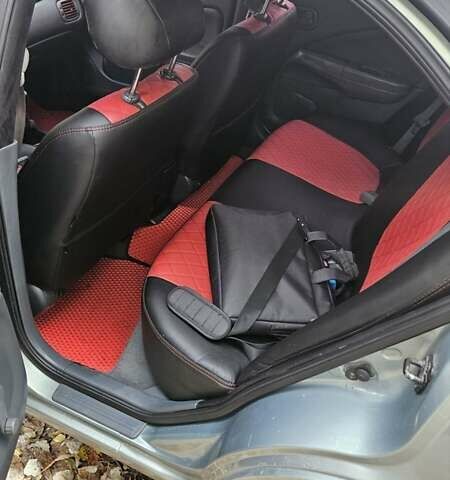 Сірий Ніссан Альмера Класік, об'ємом двигуна 1.6 л та пробігом 167 тис. км за 4400 $, фото 5 на Automoto.ua