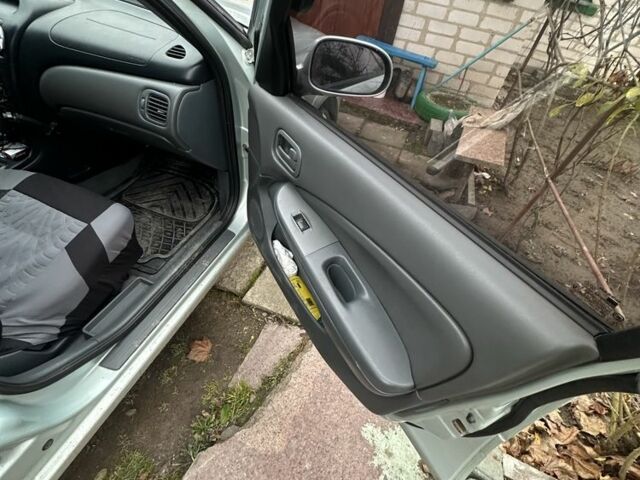 Сірий Ніссан Альмера Класік, об'ємом двигуна 1.6 л та пробігом 300 тис. км за 4200 $, фото 4 на Automoto.ua