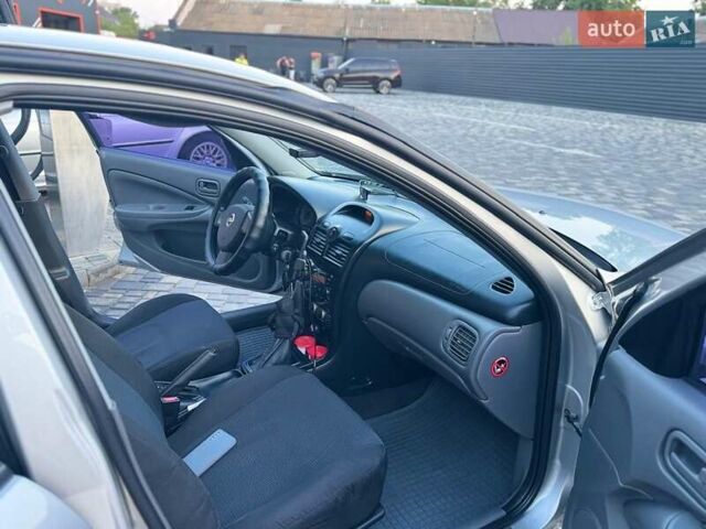 Серый Ниссан Альмера Классик, объемом двигателя 1.6 л и пробегом 95 тыс. км за 6600 $, фото 11 на Automoto.ua