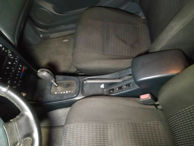 Серый Ниссан Альмера Классик, объемом двигателя 1.8 л и пробегом 230 тыс. км за 4599 $, фото 5 на Automoto.ua