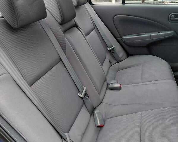 Синий Ниссан Альмера Классик, объемом двигателя 1.6 л и пробегом 218 тыс. км за 4800 $, фото 16 на Automoto.ua