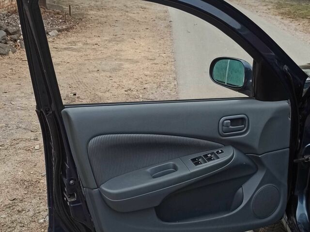 Синий Ниссан Альмера Классик, объемом двигателя 1.6 л и пробегом 211 тыс. км за 3700 $, фото 8 на Automoto.ua