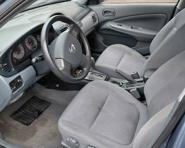 Синий Ниссан Альмера Классик, объемом двигателя 1.6 л и пробегом 218 тыс. км за 4800 $, фото 14 на Automoto.ua