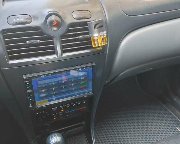 Синий Ниссан Альмера Классик, объемом двигателя 1.6 л и пробегом 230 тыс. км за 4300 $, фото 5 на Automoto.ua