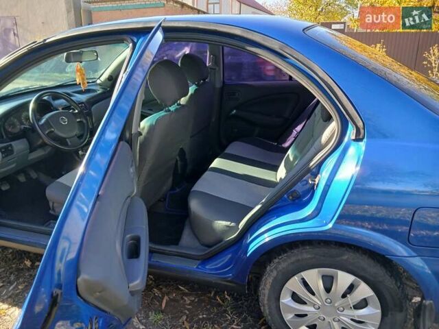 Синий Ниссан Альмера Классик, объемом двигателя 1.6 л и пробегом 221 тыс. км за 4500 $, фото 3 на Automoto.ua